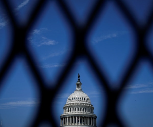 capitol building behind fence