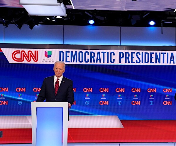 Joe Biden alone on stage during a debate