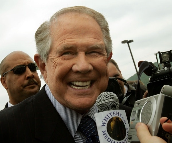 pat robertson smiles at camera