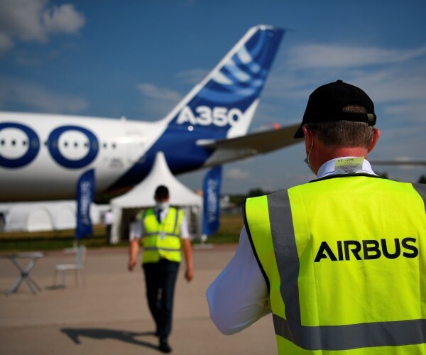 An Airbus A350 passenger aircraft on display.