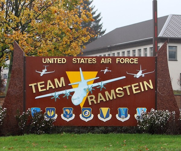 a sign announces team ramstein, a u.s. air force base