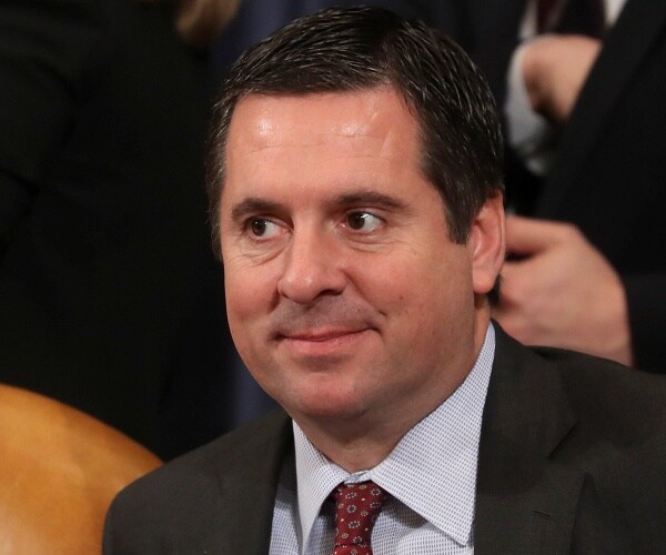 devin nunes sits in meeting