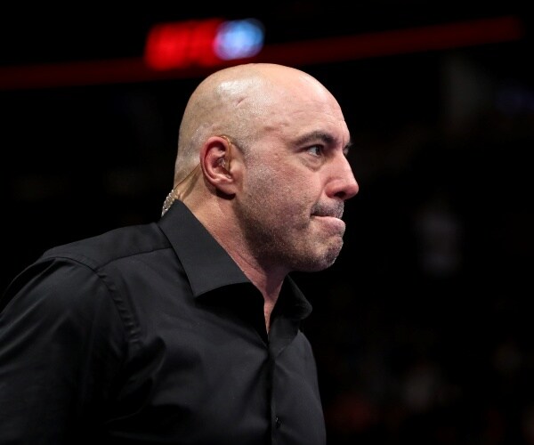 side profile of joe rogan wearing a black shirt