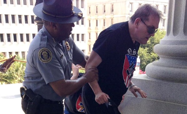 Officer LeRoy Smith: Black Cop Photographed Helping KKK White Supremacist