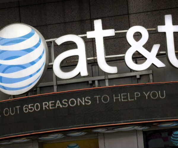 the window of an AT&T store with a logo