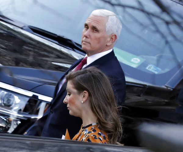 mike pence walks and looks back