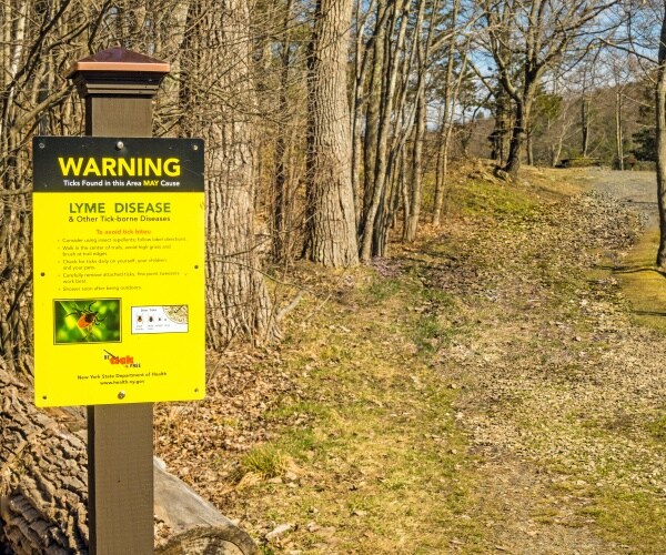 sign on path warning walkers of Lyme disease