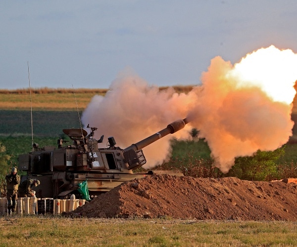 soldier fires rockets from tank