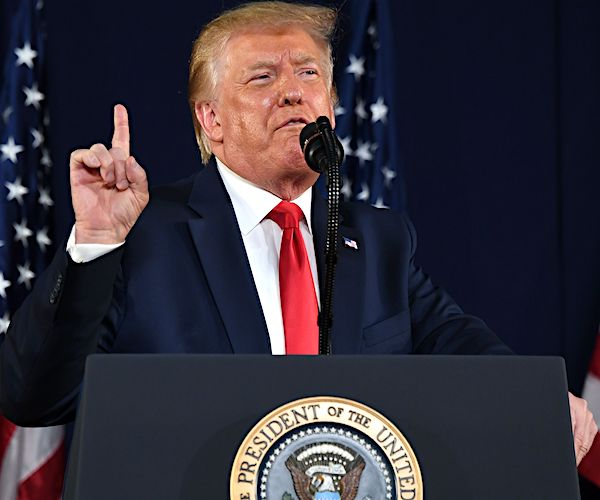 president donald trump points during an impassioned speech