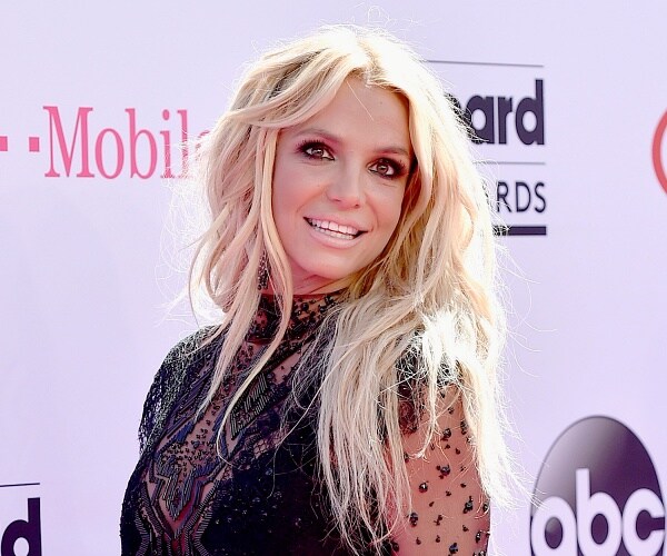 britney spears stands on red carpet