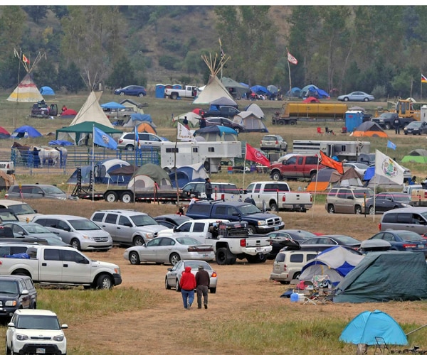 Pipeline Protesters Staying Near Camp After Tense Standoff