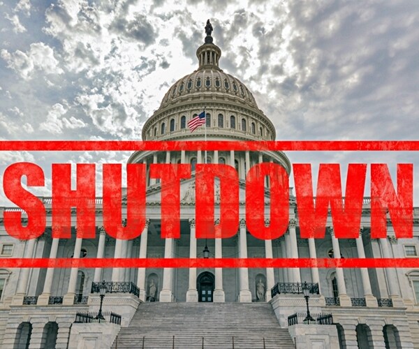 united states capitol building in washington, dc with shutdown stamp effect 

