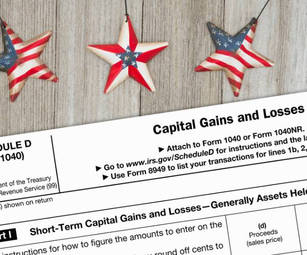 a schedule d tax form showing capital gains and losses