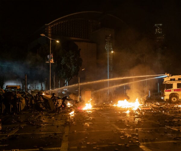 Hong Kong Police Storm University Held by Protesters