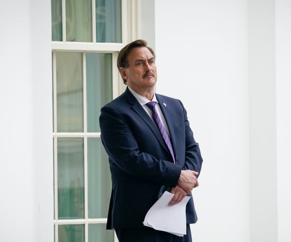 MyPillow CEO Mike Lindell waits outside the West Wing of the White House before entering on January 15