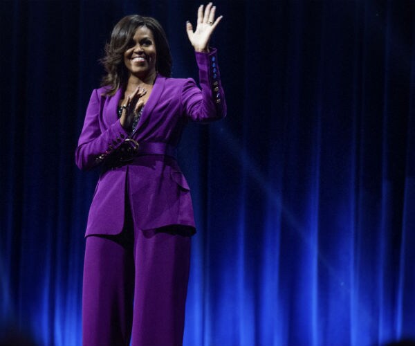 michelle obama attends An Intimate Conversation about her book 'becoming' at state farm Arena in May in atlanta.