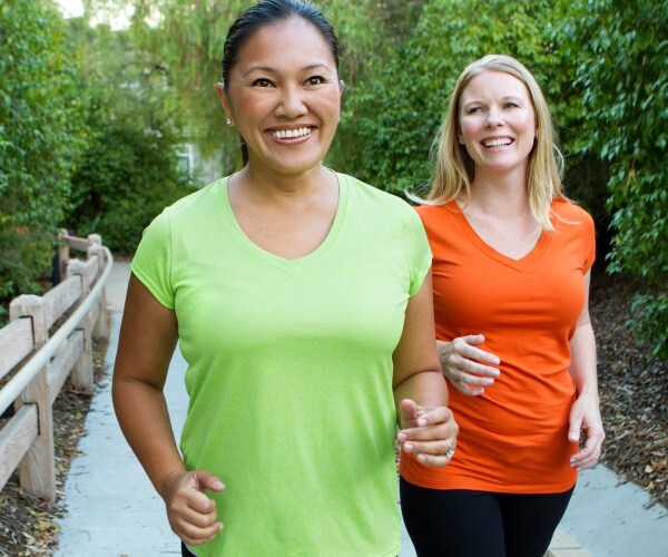 women outside fitness walking