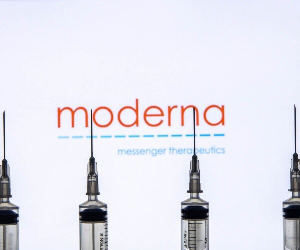 Moderna logo and four syringes