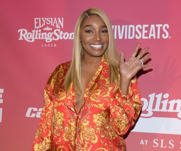 nene leakes poses on the red carpet