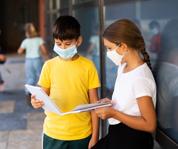 school children wearing masks