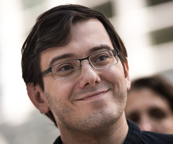 martin shkreli smiles as he leaves court