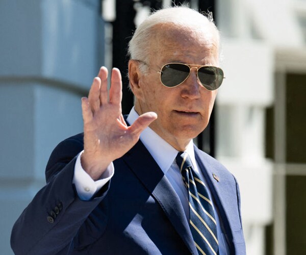 president joe biden walks to marine one at the white house