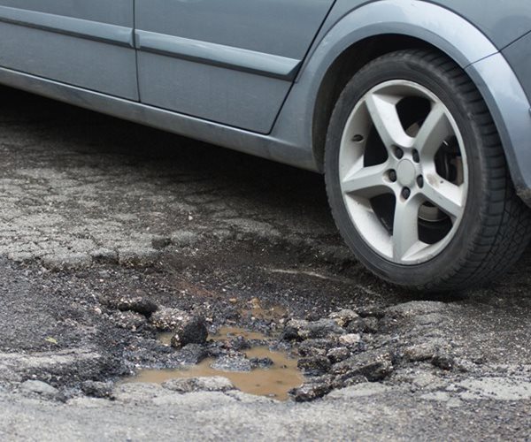 Electric Vehicles Cause Double the Pothole Damage | Newsmax.com