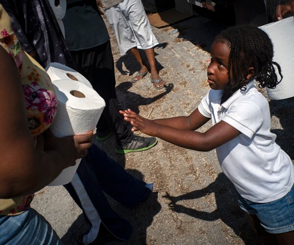 As Desperation Rises, Thousands in Bahamas Flee Dorian's Devastation