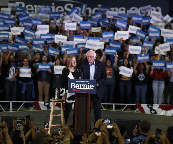 Topless Protesters Disrupt Sanders' Speech