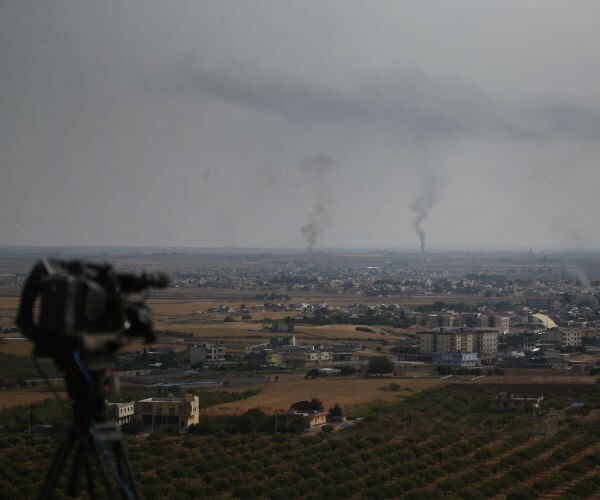 Kurdish-Led Forces Say They Have Pulled Out of Syria Border Town