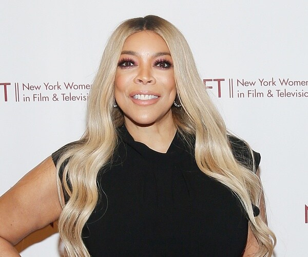 wendy williams stands on red carpet