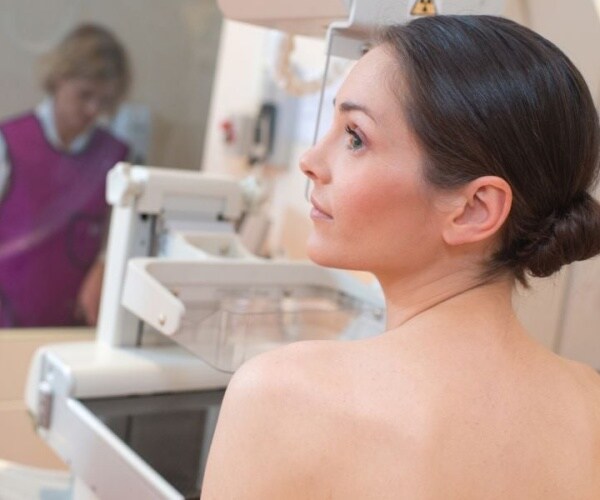 Woman getting a mammogram