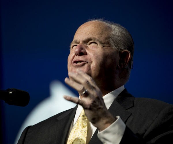 rush limbaugh is shown making a speech in florida