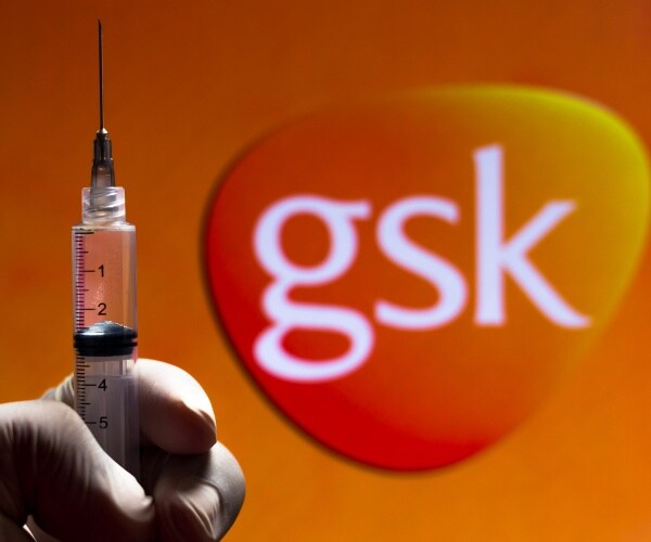 syringe and GSK logo