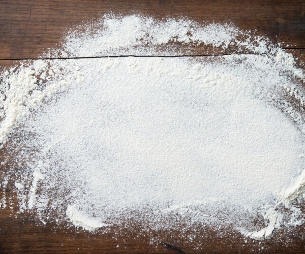 flour spread out on baking surface