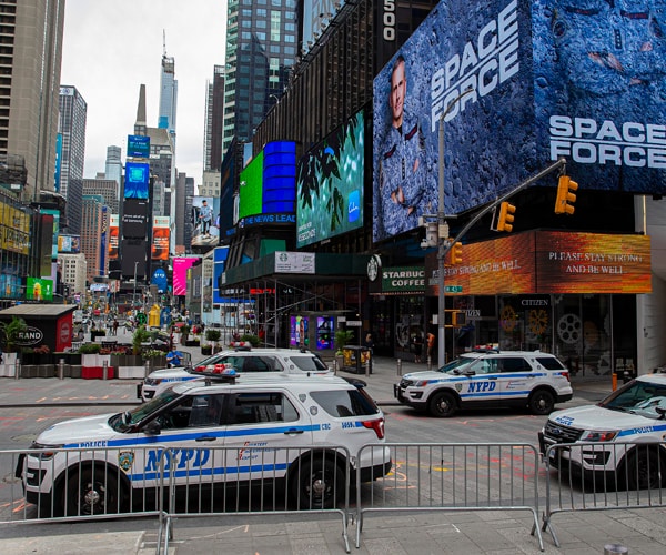 police cars are parked in new york city's times square