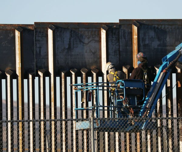 WashPost: Smugglers Have Sawed Through, Climbed Over New Wall Sections