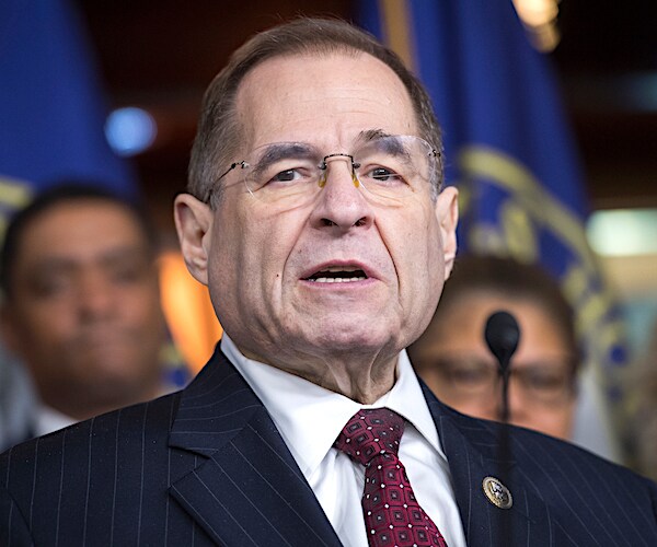 jerrold nadler looks up and speaks into the podium mic during a news conference