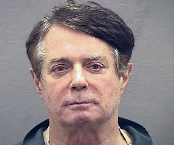 paul manafort is shown in a jail mugshot