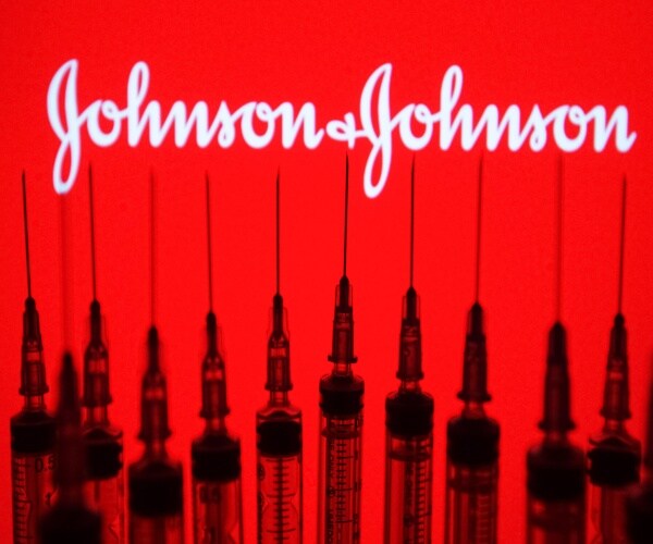 Johnson & Johnson logo with syringes