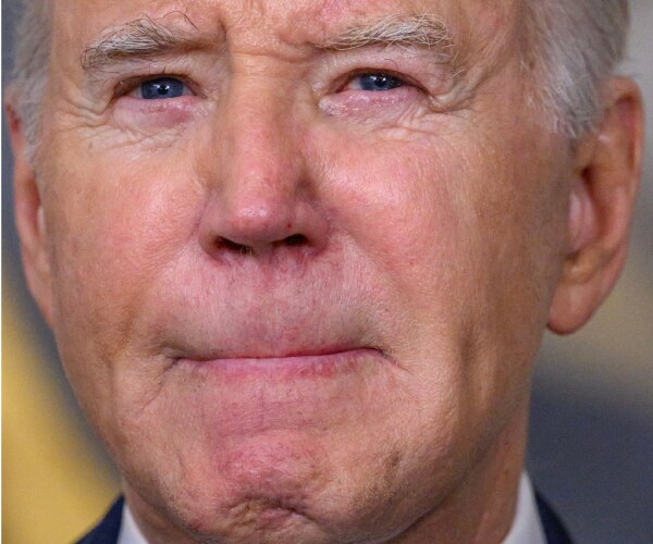 biden with pursed lips