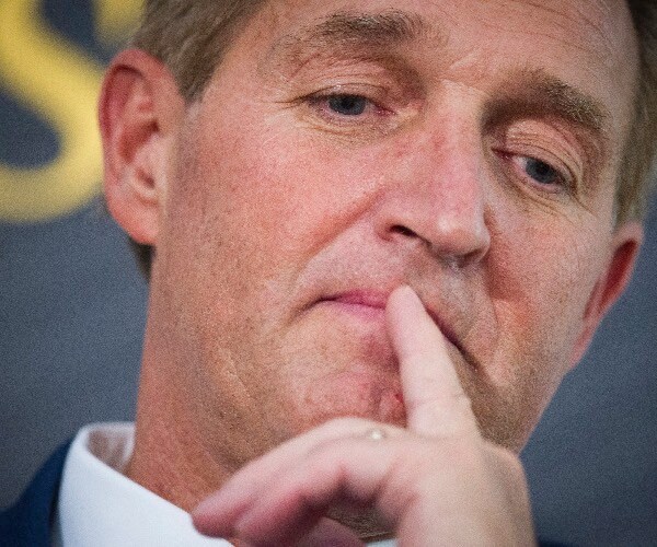 sen. jeff flake participates in an interview at the atlantic's 'the constitution in crisis' forum in washington. 