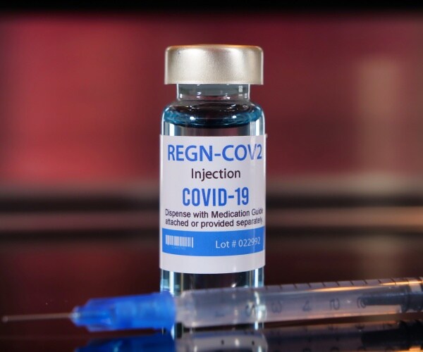 regeneron covid-19 treatment is shown in a glass bottle