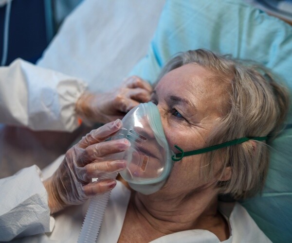 COVID patient in hospital on oxygen