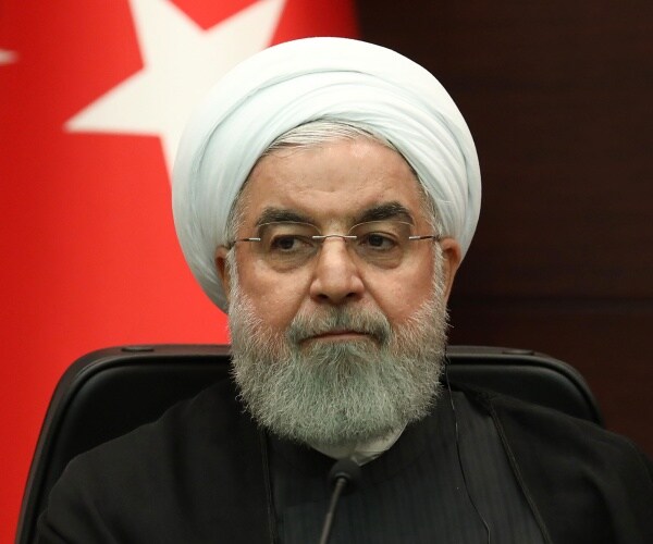 rouhani in a white turban and black coat