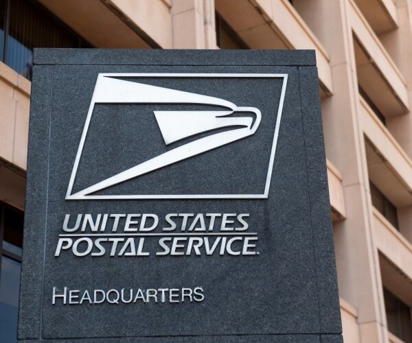 usps headquarters building with sign outside