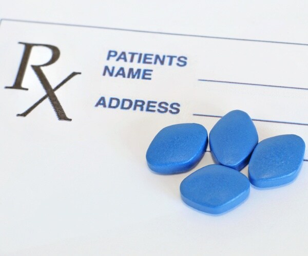 blue pills for erectile dysfunction on a prescription pad