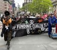 Wall Street Exodus From Climate Group Draws Scorn