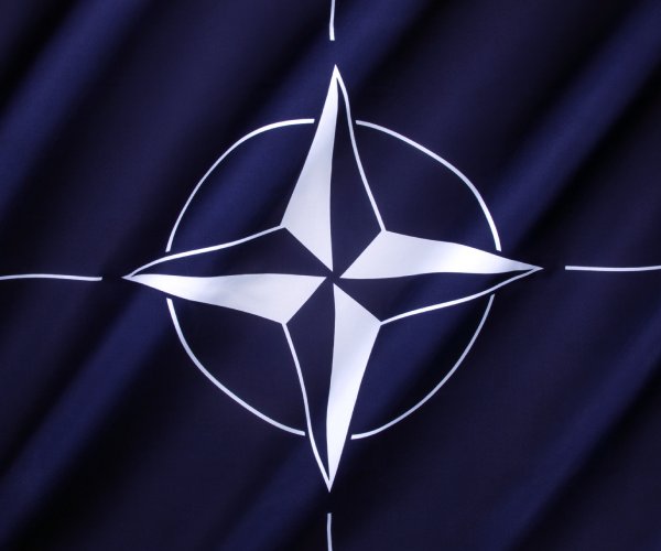 Official: EU Members of NATO Ready to Raise Defense Spending 